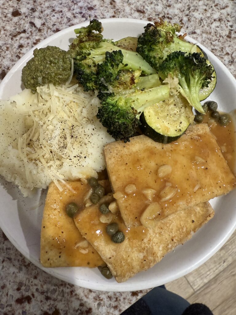 Tofu piccata with mashed potatoes and roasted vegetables